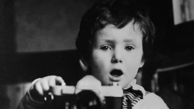 Папа приучает Романа фотографировать