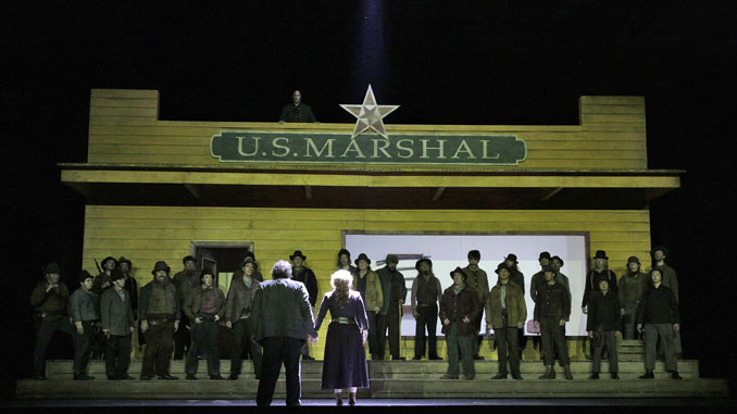 Сцена из спектакля “Девушка с Запада”. Фото - Metropolitan Opera